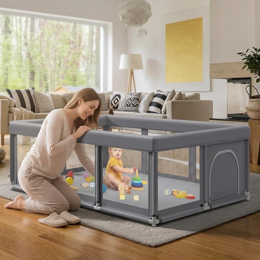 74×50 Fshibila baby playpen set up in a home living room